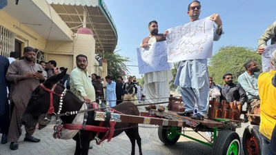 ‘Can’t afford petrol’: Pakistan PTI lawmakers ride donkey carts to assembly in protest