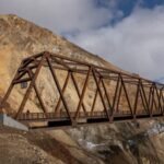 In 2021, a landslide cut Denali National Park’s only road in two; five years later a 0 million, 475-foot bridge has been built directly above the still-moving slope
