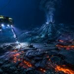 Scientists use robots more than two kilometres beneath the Pacific to discover huge lava fields around an active underwater volcano |