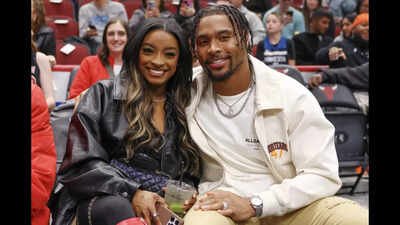 While Simone Biles and Jonathan Owens built their Texas dream mansion, Biles used a 3,998-sq-ft home as a temporary base; with the custom build finished, the 1-acre property is now listed for $1.2 million