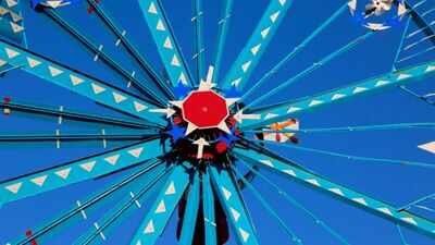 A retired North Carolina repairman built giant wind-powered sculptures from scrap; after 30 were moved downtown, the park drew 194,300 visitors and generated .3 million in regional sales