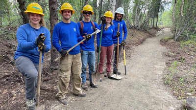 A former fuel-tank farm beside an Alaska national park visitor center has been erased; a young conservation crew restored 15,000 square yards of landscape and built 500 feet of new trail