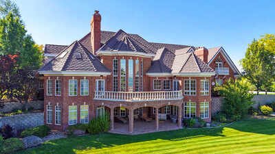 An Idaho riverfront mansion previously asking $3.86 million goes to auction without reserve on September 17; its owner has pledged the sale proceeds 50:50 to St. Jude and Mayo Clinic