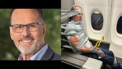 Arizona man who got duct-taped on an American Airlines flight was VP of realty firm, company says he is no longer associated