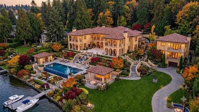 Washington couple spent nearly two decades and  million creating a resort-style retreat on 2.3 acres of Lake Washington; the two-home waterfront compound now asks  million
