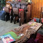 An Elvis superfan paid 0,000 for a Memphis home inspired by Graceland, which its previous owners bought for ,000; she now plans to turn its backyard caravans into another source of income