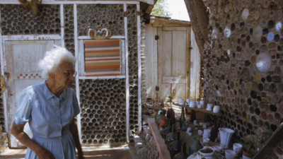 In 1956, a 60-year-old California woman found building blocks too expensive and began hauling bottles from a dump; 25 years later she had turned tens of thousands of discarded objects into a 15-building folk-art village