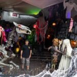 In 2017, a Michigan father turned free Halloween decorations into a backyard attraction that he says drew 18,000 visitors in 2024; nine years later, a neighbour’s complaint sparked a dispute with the city