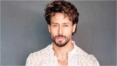 Tiger Shroff covers face, reaches home under police protection after Juhu firing; tape on hand draws attention | Hindi Movie News