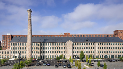 In 1848, a Massachusetts stone mill began making equipment for textile factories; after standing vacant, the 150,000-sq-ft landmark was restored for $53 million and converted into 86 apartments, 69 of them affordable