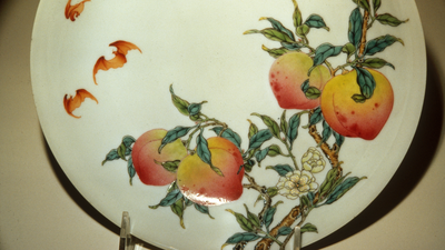 Between 1723 and 1735, Qing artisans made a porcelain bowl painted with bats and peaches; after passing through a Paris dealer and spending 87 years at a Chicago museum, it sold for .048 million in New York