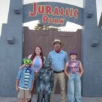 A California family spent about ,000 and more than 200 hours turning its front yard into Jurassic Park, building 13-foot gates and a dinosaur escape show that visitors can watch for free