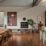 ​An old Brisbane hospital outbuilding was transformed into a five-bedroom home, with its industrial sawtooth roof and exposed brick left intact; the unique home on a 1,008 sq m plot sells for A.45 million