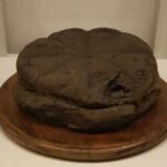When Mount Vesuvius erupted in AD 79, a round loaf of bread in Herculaneum was buried under volcanic debris; it was found carbonised nearly 2,000 years later, still showing its eight segments and a baker’s stamp