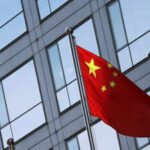 China elevates military general to Politburo