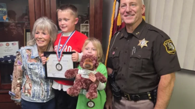 A Michigan 5-year-old found his grandmother unconscious, kept his 3-year-old sister safe and ran down a rural road for help; months later, officials honored him for helping save her life