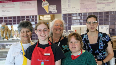 A retired Virginia optometrist opened an ice-cream shop in 2021 to create jobs for people with disabilities; her two stores now employ 35 and she says there is a waiting list to work there