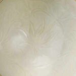 In 2007, a New Yorker paid  for a white bowl at a yard sale and kept it in the living room for years; experts later identified it as a 1,000-year-old Chinese artefact, and it sold for .225 million