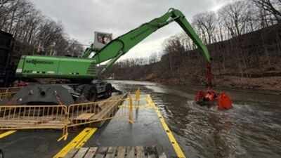Crews are removing over 850,000 cubic yards of toxic sediment from Ohio’s Cuyahoga River; the waste is being stabilised two miles downstream |