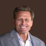 Author David Baldacci helped turn food banks into places where families could also find books; his Feeding Body & Mind initiative has collected and distributed more than 1 million books