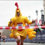A man ran 26.2 miles in a giant inflatable chicken costume; he broke a Guinness World Record while raising more than £2,200 for vulnerable children | World News