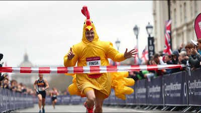A man ran 26.2 miles in a giant inflatable chicken costume; he broke a Guinness World Record while raising more than £2,200 for vulnerable children | World News