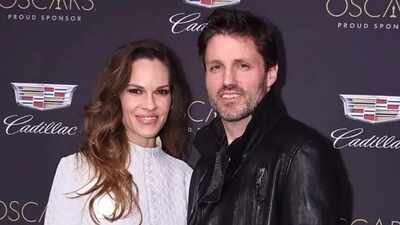 Hilary Swank shows off baby bump after pregnancy announcement; 52-year-old expecting third child with husband Philip Schneider | English Movie News