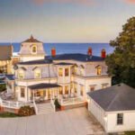 Iconic 1880s Rhode Island waterfront social club is being offered for the first time in 50 years; after a .2 million price cut, the historic five-bedroom property now asks .75 million