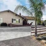 A California home hid a covered miniature town and working model railway in its backyard; the 1,460-sq-ft pool property listed at 5,000 and sold in February for 5,000