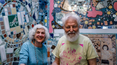 Philadelphia artist Isaiah Zagar turned bottles, bike wheels and ceramic shards into a 3,000-square-foot maze; after a 2004 threat to dismantle it, the community saved it and tickets now frequently sell out | World News