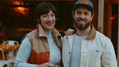 An LA advertising couple bought a $925,000 California farm with no house, turned its barn loft into a home for $100,000, and built an apple orchard and cider business into a family destination