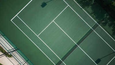A former Starbucks franchise boss built a tennis court on agricultural land in Hampshire; after years of objections, an inspector upheld enforcement action and gave him six months to remove the unauthorised works