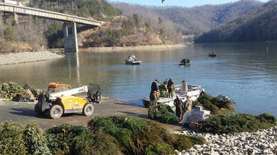 Kentucky collected about 5,000 discarded Christmas trees in 2026 instead of sending them to landfills; officials sank 1,700 in a single lake to replace lost underwater shelter for fish