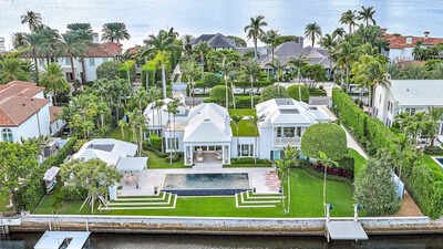 In 2014, a Palm Beach couple paid  million for a dated 1955 waterfront house, rebuilt it through an extensive renovation, then sold the Everglades Island estate 11 years later for .4 million