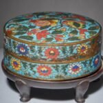 In 1946, a collector bought a Ming-era cloisonné pomegranate box for £19; 77 years later, it was found in an attic, auctioneers expected £6,000 to £10,000 before bidding pushed it to £288,000 | World News