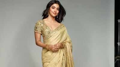 Pooja Hegde serves timeless ethnic elegance in a beige gold tissue silk saree worth Rs 1.91 lakh | Hindi Movie News