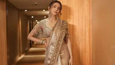Rakul Preet Singh serves understated luxury in a Rs 2.75 lakh bronze gold tissue saree and embroidered zardozi blouse for ‘Ramayana: Rise of a Legend’ trailer launch – Exclusive |