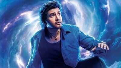 ‘Athisaya Piravi’ first look out: Santhanam’s comedy sci-fi film borrows Rajinikanth’s 1990 title | Tamil Movie News
