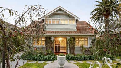 A 1920s Arts and Crafts home in Melbourne’s Alphington heads to auction for .4 million; the historic home comes with Kookaburra stained-glass windows and distinctive architectural features