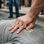 Four University of Washington students built a wallet-sized patch that gives rescuers real-time LED guidance during CPR; the invention has now won the 2026 Collegiate Inventors Competition and a ,000 prize