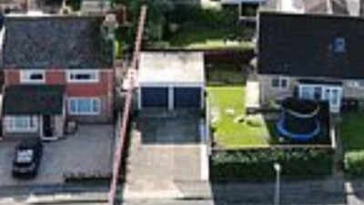 In 2022, a Russian Orthodox priest bought a £470,000 home beside a woman who paid £260,000 for hers; their fight over a one-metre strip of land has led to CCTV, criminal charges and a holy-water blessing at the fence