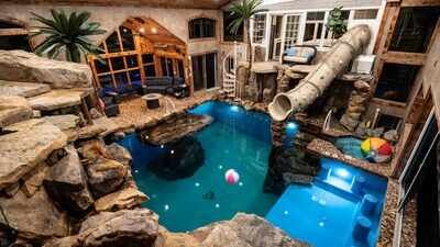 An Indiana man sketched a backyard pool on a napkin after a 1.5-year installation wait; two years later it became a 60,000-gallon private water park now renting for 0 an hour