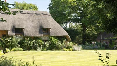 In 2008, Sienna Miller bought a 16th-century thatched cottage and later replaced its gravel driveway with a wildflower meadow; now, the half-acre retreat is on sale for £1.75 million