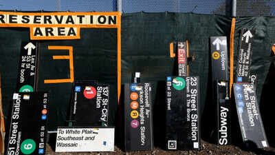 New Yorkers queued for hours to buy discarded subway hardware at an MTA sale where old signs cost 0 to over ,000, orange seats sold for about 0 and Spike Lee picked up a Penn Station sign