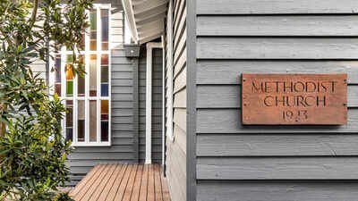 A 1923 Methodist church in Australia later served as a Sunday school and dance school before becoming a three-bedroom home with a cathedral ceiling and coloured glass; it is now listed for $865,000 to $950,000