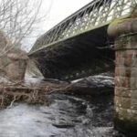 Two spans of a 140-year-old Scottish railway bridge fell into the River Spey; engineers are investigating the collapse as restoration options could cost more than £1 million | World News