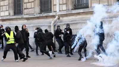 Tear gas fired as thousands protest rising cost of living across France