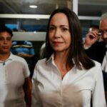 ‘I am here. With you’: Maria Corina Machado returns to Venezuela from exile
